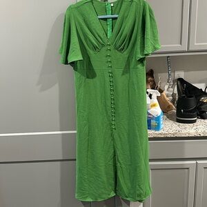Green tea length flutter sleeve dress